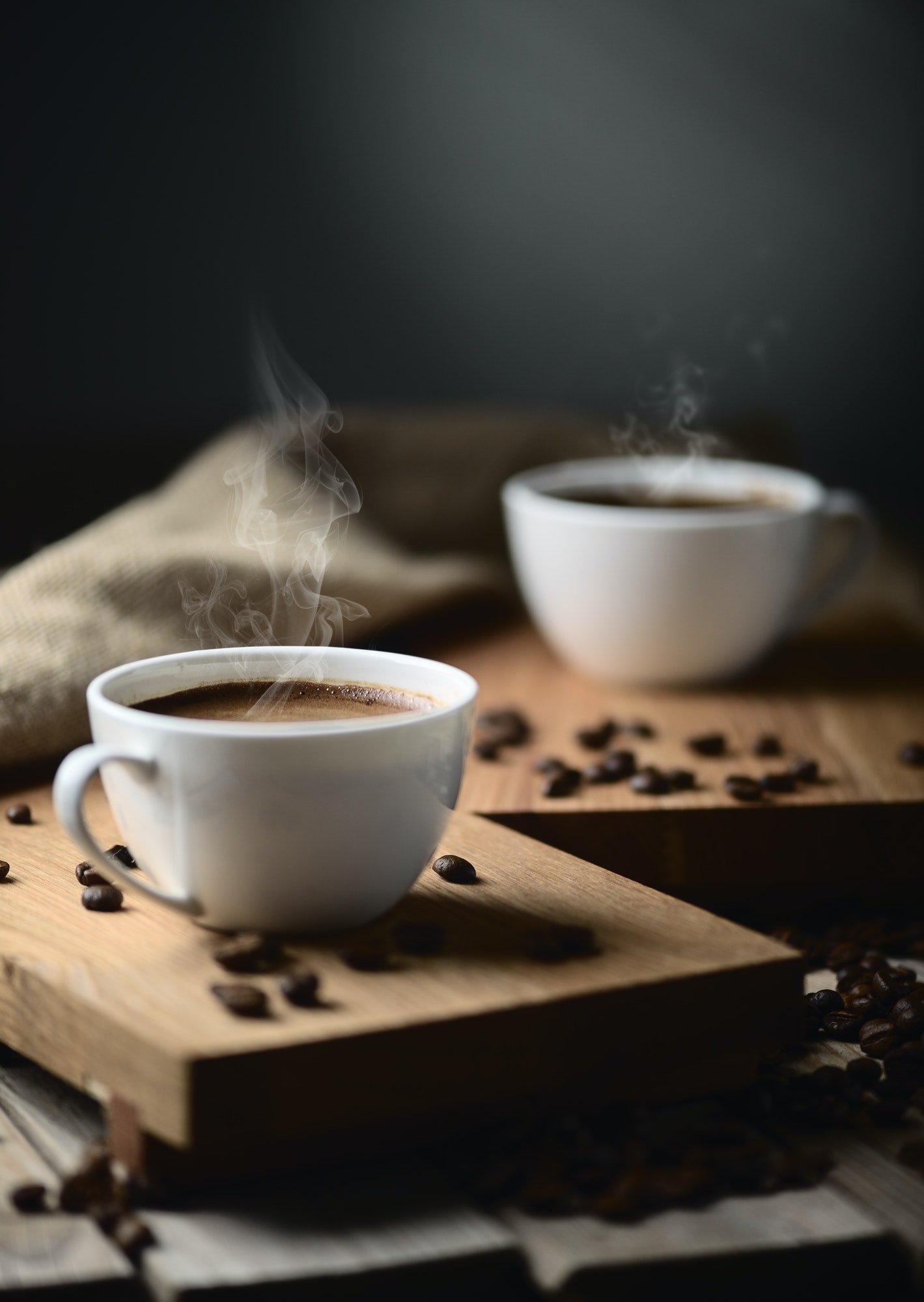 coffee cups and coffee beans