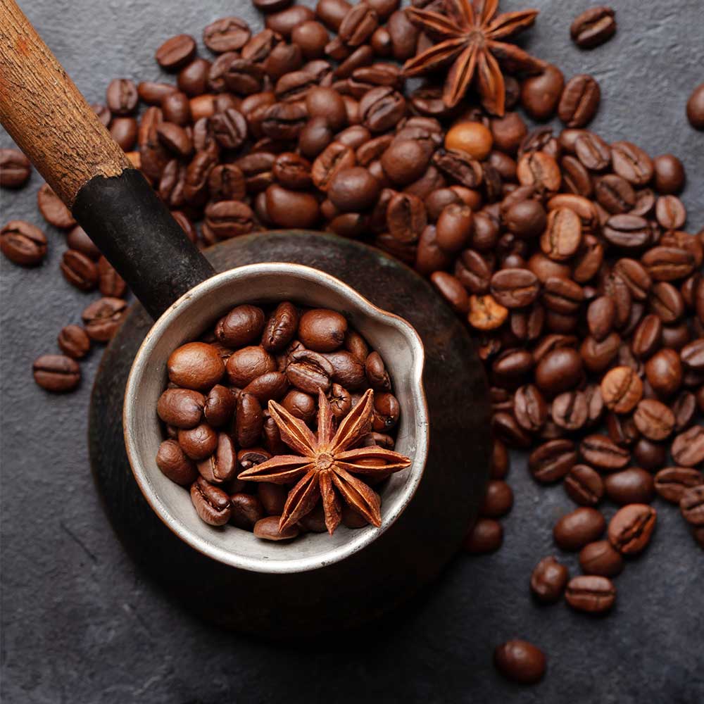 roasted coffee beans in turkish jezve 8UGZBB6